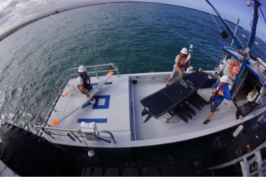 Puma UAS and Wave Glider on deck preparing to deploy. Photo courtesy of Liquid Robotics.