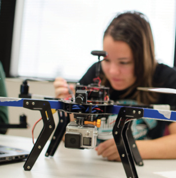 girl working on drone